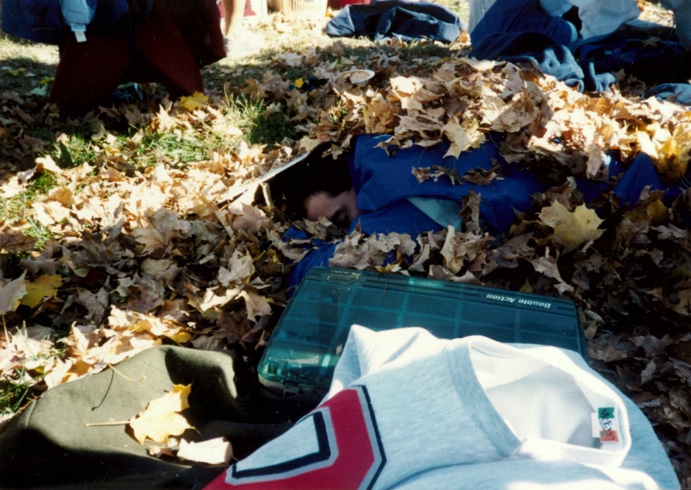 Eric Matyac asleep under the leaves
